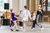 Dance workshop for children at Flatts Youth Centre, Easington A group of children and an adult form a loose circle. All are dancing with one foot forward into the circle.