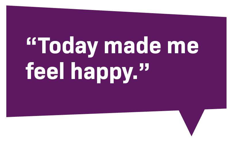 A purple rectangular speech bubble containing a quote in white text that reads: 'Today made me feel happy'