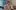 Science-Fridays-1-aspect-ratio-16-9 A boy of approximately ten years old is at a desk. He is wearing a beige hoody. He has a bowl haircut and has mousey hair. He has safety glasses on and is stirring a liquid in a clear beaker.