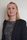 Councillor Beth Jones - Sunderland City Council Person standing in front of a plain background, wearing a black blazer over a geometric black-and-white patterned top, with straight blonde hair and a neutral expression.