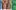 Weaving-Image-LS-scaled-aspect-ratio-16-9 A multicoloured weaved flag. The weave is different thicknesses which nave been sewn together. The bottom of the flag is made of blue and green stands of wool to form tassels and larger green spotted ribbon.