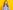 A girl of approximately 13 in 3D glasses and wearing a denim shirt. She is smiling whilst raising her hands in fists. Her arms are bent at the elbow. She is standing against a yellow background.