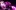 A close-up of two performers with a glowing white dragon puppet. One performer wears a bodysuit with a glowing pattern and a crown of flowers and branches, smiling while holding a light prop. The other holds the dragon puppet and wears glowing accessories. The scene is lit with purple-pink light.